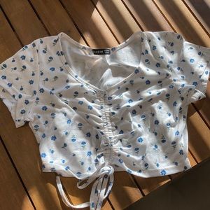 White halter top with blue flowers